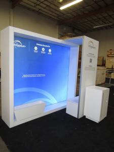 VK-1356 Custom Modular Exhibit with Backlit Graphics, Planter Box, Locking Counter with LED Toe-kick Lighting and Storage, and Arch -- View 2